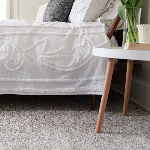 Bed and coffee table - Freedom Carpeting & Countertop | Wisconsin